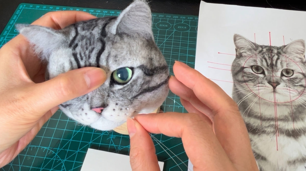 Refining markings on a wool felt pet replica